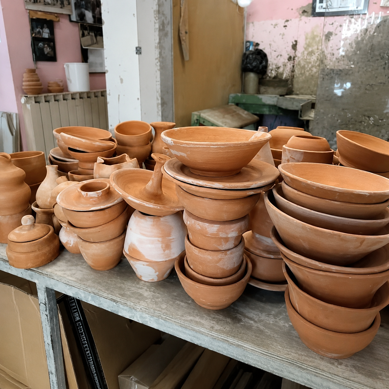 Mold a ceramic vase and decorate it with flowers in Florence