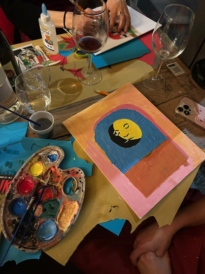 Paint and sip amidst colors and wine in a creative space in Milan