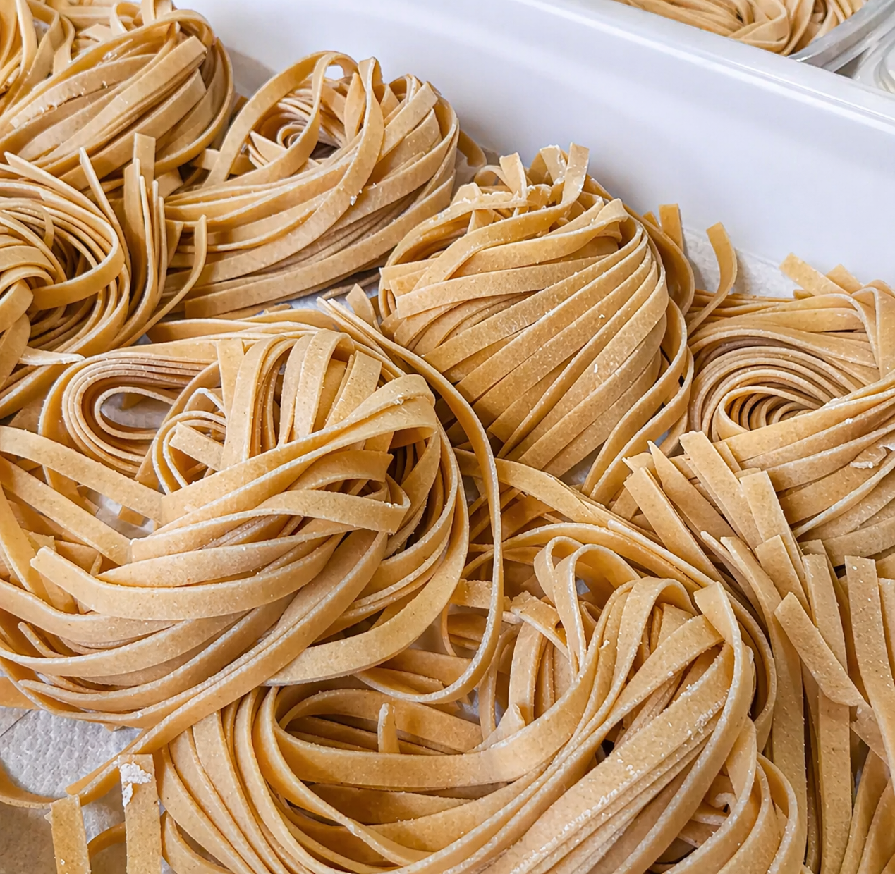 Prepare fresh pasta by hand in an old mill in Tuscany
