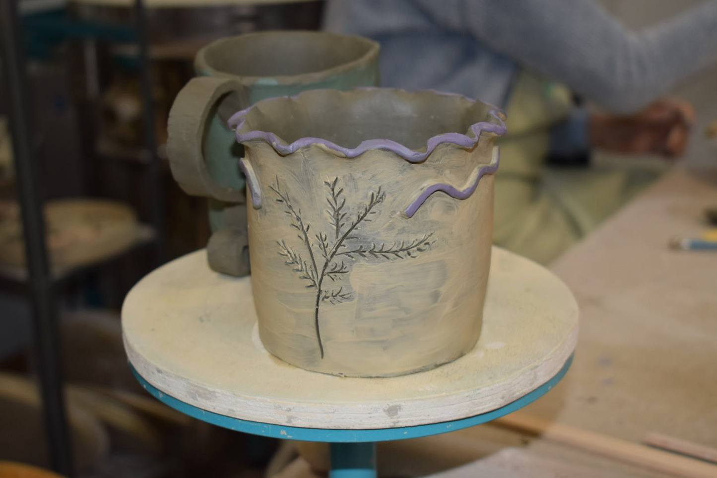 Create a small ceramic object and paint it