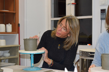 Create a small ceramic object and paint it