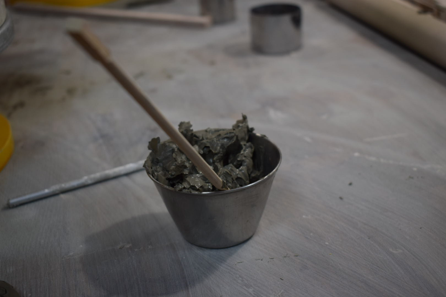 Create a small ceramic object and paint it