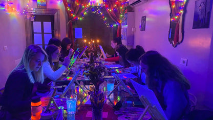 Paint with fluorescent colors during a glow cocktail night in Venice