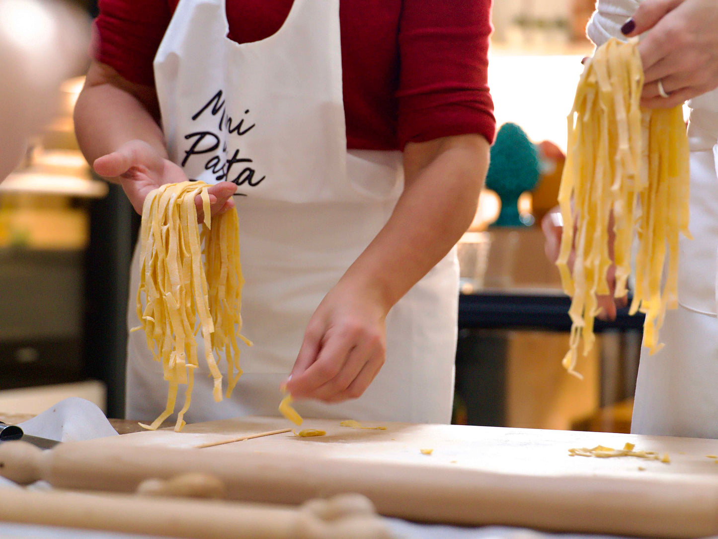 Discover the art of fresh pasta or risotto in a cooking class in Como