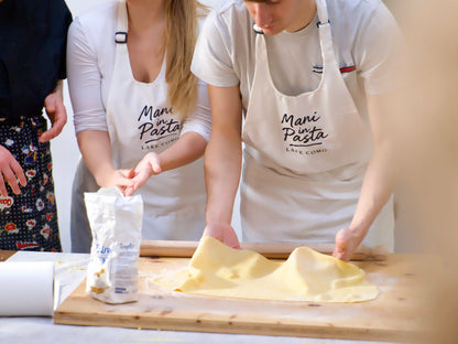 Discover the art of fresh pasta or risotto in a cooking class in Como