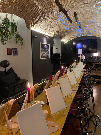 Paint and sip amidst colors and wine in a creative space in Milan