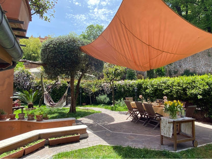 Prepara pasta e tiramisù in una vera casa romana con una chef locale